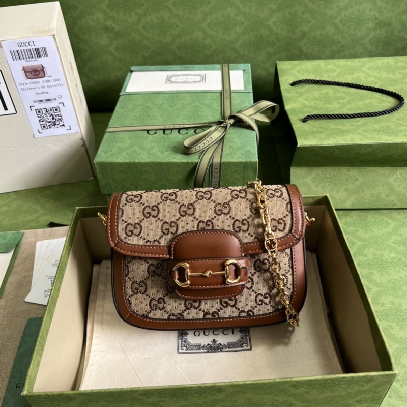 G*u*i satchel bags